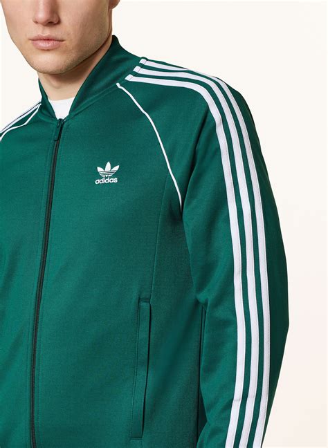 adidas trainingsjacke herren logo an den ärmeln|adidas Originals Trainingsjacke mit Logo.